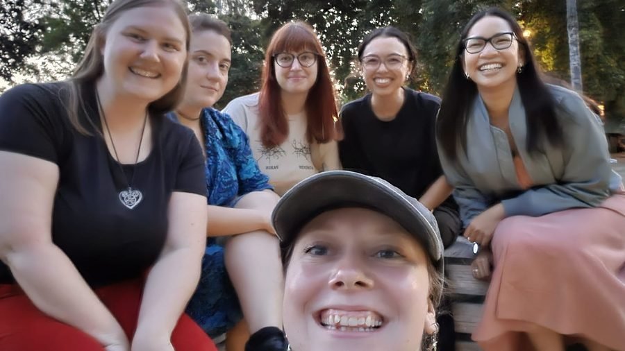 Kino Klub members gathered outdoors in the evening